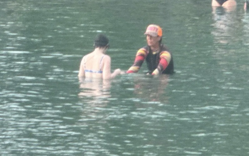 Coach Victoria teaching swim lesson